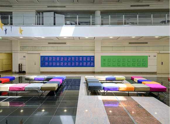 Spacious lobby with colorful seating arrangements.